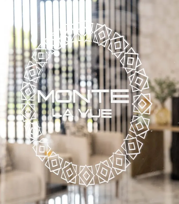 Monte La Vue logo on a patterned lounge wall